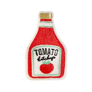 May include: Embroidered iron-on patch of a red ketchup bottle with a white label that says "TOMATO ketchup" and a red tomato illustration.