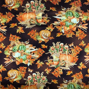 May include: A brown fabric with a repeating pattern of fall harvest gourds, pumpkins, and leaves. The gourds and pumpkins are in shades of green, orange, and white. The leaves are in shades of orange, brown, and yellow.