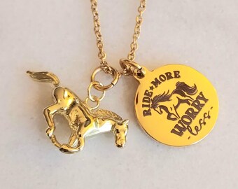 May include: Gold necklace with a horse charm and a round pendant that says "Ride More Worry Less" with a small horse silhouette.