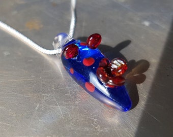 Blue and Red Spotted Glass Sea Slug Necklace, handmade lampworked glass nudibranch animal pendant
