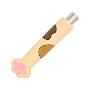 May include: A USB flash drive with a cat paw design. The drive is beige with brown spots and a pink paw print. The USB connector is silver.