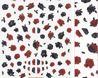 May include: Sheet of black and red rose nail stickers. The sheet is white and has the text "daily charme" and "DC833" printed on it.