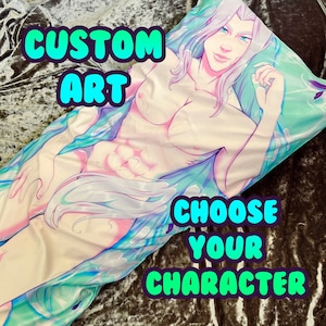 May include: A custom body pillow featuring a light blue and white illustration of a person with long white hair. The text "CUSTOM ART" and "CHOOSE YOUR CHARACTER" is printed on the pillow.