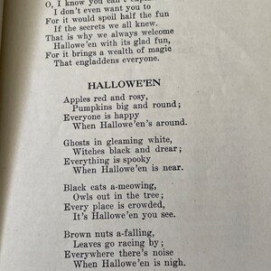 May include: A vintage poem about Halloween, with illustrations of pumpkins, ghosts, and cats. The poem describes the fun and spooky aspects of the holiday.