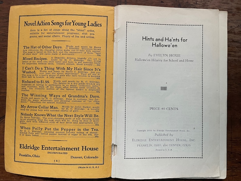 May include: A yellow and white book cover with the title "Novel Action Songs for Young Ladies" and the text "Hints and Ha'nts for Hallowe'en" by Evelyn Hoxie. The book is published by Eldridge Entertainment House, Inc. and costs 40 cents.