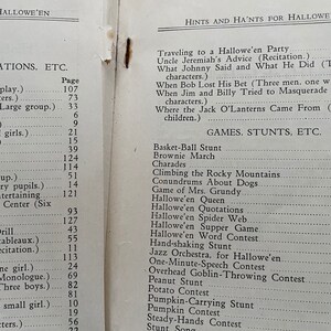 May include: A black and white printed page with the title "Hints and Ha'nts for Hallowe'en" and a list of games and stunts for a Halloween party. The list includes "Basket-Ball Stunt", "Brownie March", "Charades", "Climbing the Rocky Mountains", "Conundrums About Dogs", "Game of Mrs. Grundy", "Hallowe'en Queen", "Hallowe'en Quotations", "Hallowe'en Spider Web", "Hallowe'en Supper Game", "Hallowe'en Word Contest", "Hand-shaking Stunt", "Jazz Orchestra, for Hallowe'en", "One-Minute-Speech Contest", "Overhead Goblin-Throwing Contest", "Peanut Stunt", "Potato Contest", "Pumpkin Contest", "Pumpkin-Carrying Stunt", "Stunt Song", "Steady-Hands Contest", "Stunt Song - The Slow Crowd", "Stunt Song - The Swift Crowd", "Sucker Contest", "Toeing the Line".