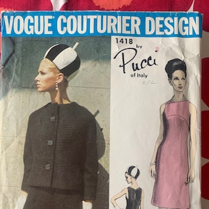May include: Vintage Vogue Couturier Design sewing pattern #1418 by Pucci of Italy. The pattern features two designs: a black and white dress with a matching jacket and a pink sleeveless dress.