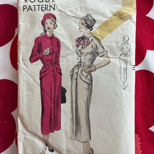 May include: Vintage Vogue Pattern with illustrations of women's dresses. The pattern cover features the text "VOGUE PATTERN" and size information. The illustrations depict a long-sleeved dress and a short-sleeved dress. The cover is aged with visible wear.
