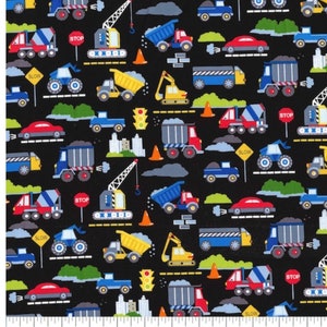 May include: A black fabric with a repeating pattern of construction vehicles, including dump trucks, cement mixers, excavators, cranes, and cars. The pattern also includes traffic signs, such as "STOP" and "SLOW", as well as traffic lights and cones.