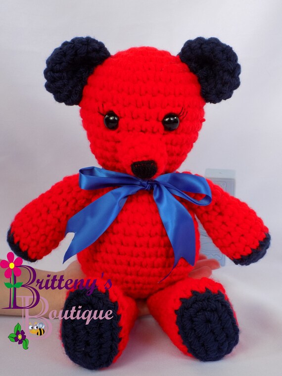 teddy bear with blue ribbon