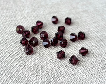 5mm Burgundy Austrian Bicone Crystals - Burgundy - Package of 20