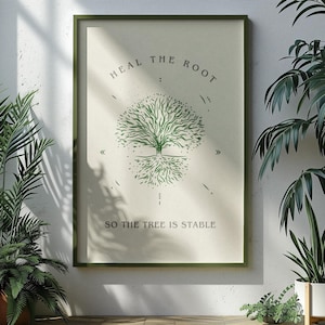May include: A framed print featuring a green tree illustration and the text "Heal the root so the tree is stable". The print is hanging on a white wall with green plants in pots in front of it.