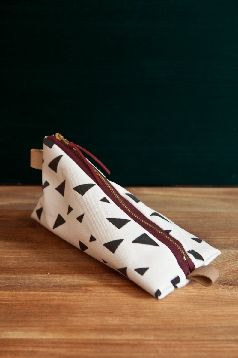 HOME WORK design pencil case with triangle pattern image 1