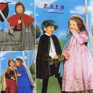 May include: A Simplicity Costumes sewing pattern envelope featuring illustrations of children wearing various medieval-style outfits, including capes, a pink dress with a floral pattern, a blue dress, and a red dress with a gold cape.