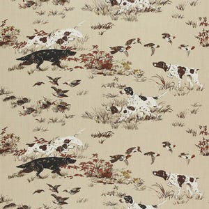 May include: A beige fabric featuring a repeating pattern of dark brown and white hunting dogs in various poses, including running and pointing, interspersed with small flying birds and stylised brown and green foliage throughout the design.
