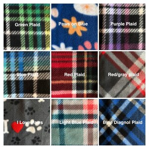 May include: Nine fabric swatches showing different patterns and colors. The swatches include green plaid, blue plaid, red plaid, light blue plaid, blue diagonal plaid, red and gray plaid, purple plaid, paws on blue, and a gray swatch with the text "I Love Paws" and a red heart.