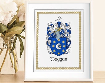 Könnte beinhalten: Ein weißer gerahmter Druck mit goldener Umrandung, der ein blaues und goldenes Wappen mit dem darunter gedruckten Namen "John Duggan" zeigt.