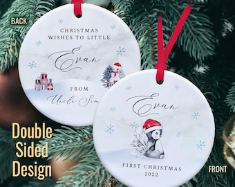 Personalised Baby’s First Christmas – Penguin deign. Ceramic ornament - unique double sided. Add senders name.