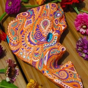 painted rock #TattooAlien #PaintedRockAlien #AlienWithTattoos #ColorfulAlienHeadStone #RockAlienPainting