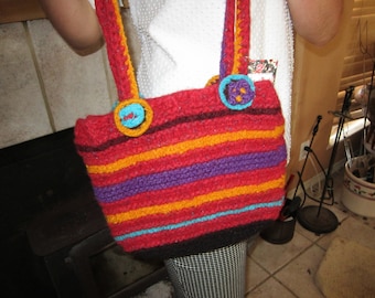 medium size handknit multi-colored felted wool shoulder purse;knitted flowers; worn from shoulder;lined; zipper pocket;magnet snap closure