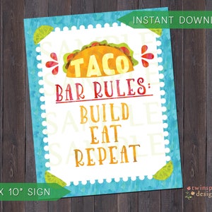 May include: A printable 8x10 inch sign with a blue background and a white border. The sign features a cartoon taco with the text "Taco Bar Rules: Build Eat Repeat".