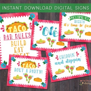May include: A set of five printable signs with a pink watercolor background and white text. The signs feature a taco theme and include phrases like "Taco Bar Rules", "Taco Bout A Party!" and "No Time To Siesta, It's Time To Fiesta!"