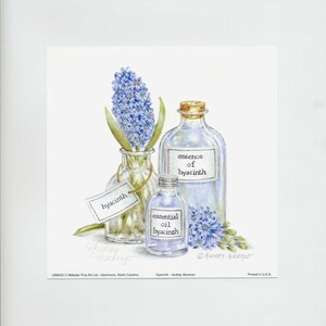 Small blue glass bottle with the label essential oil hyacinth brings together this trio of beautiful blues.