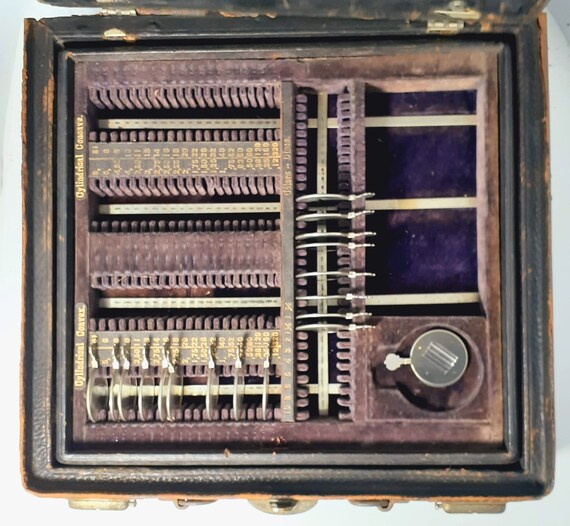 Curious Antique Optometrist's Fitting Kit With 60 Trial Lenses and