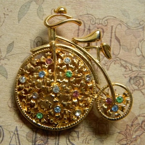 Charming Vintage Penny Farthing Bicycle Brooch. Mirror Finished Gold Tone High Wheel Bicycle Pin. Glass Faux Gemstones.