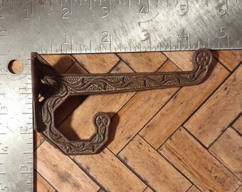 Splendid Antique Victorian Cast Iron Wall Hook. Elegant Style. Rust Toned Enamel Finish. Only 1 Available. Wow!