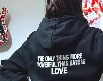 Black Hooded Jumper, Double-Sided Print Love is Our Power. Positive Quote
