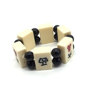 1960s mahjong tile bracelet thick ivory colored tiles with black beads.