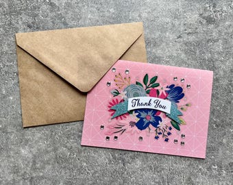 Tarjeta de agradecimiento con flores hecha a mano