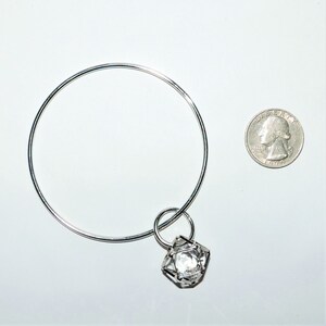 Silver Plated Bangle Bracelet With Large Geometric Caged Rhinestone Charm