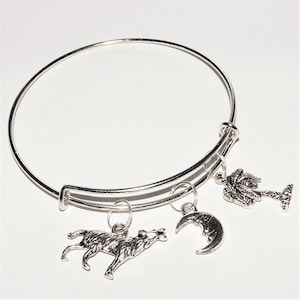 The Charleston Wolff Logo Adjustable Silver Tone Charm Bangle Bracelet