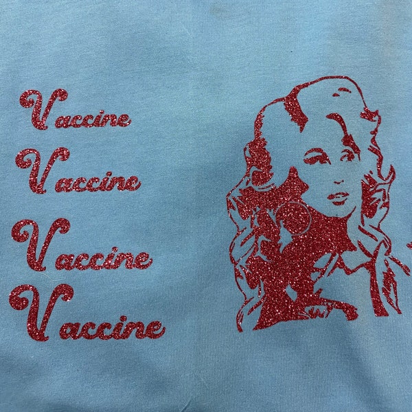 Dolly wants “to make sure you get your Vaccine” shirt!