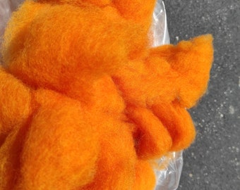 Orange Coopworth Roving.  Approximately 1.5 lbs