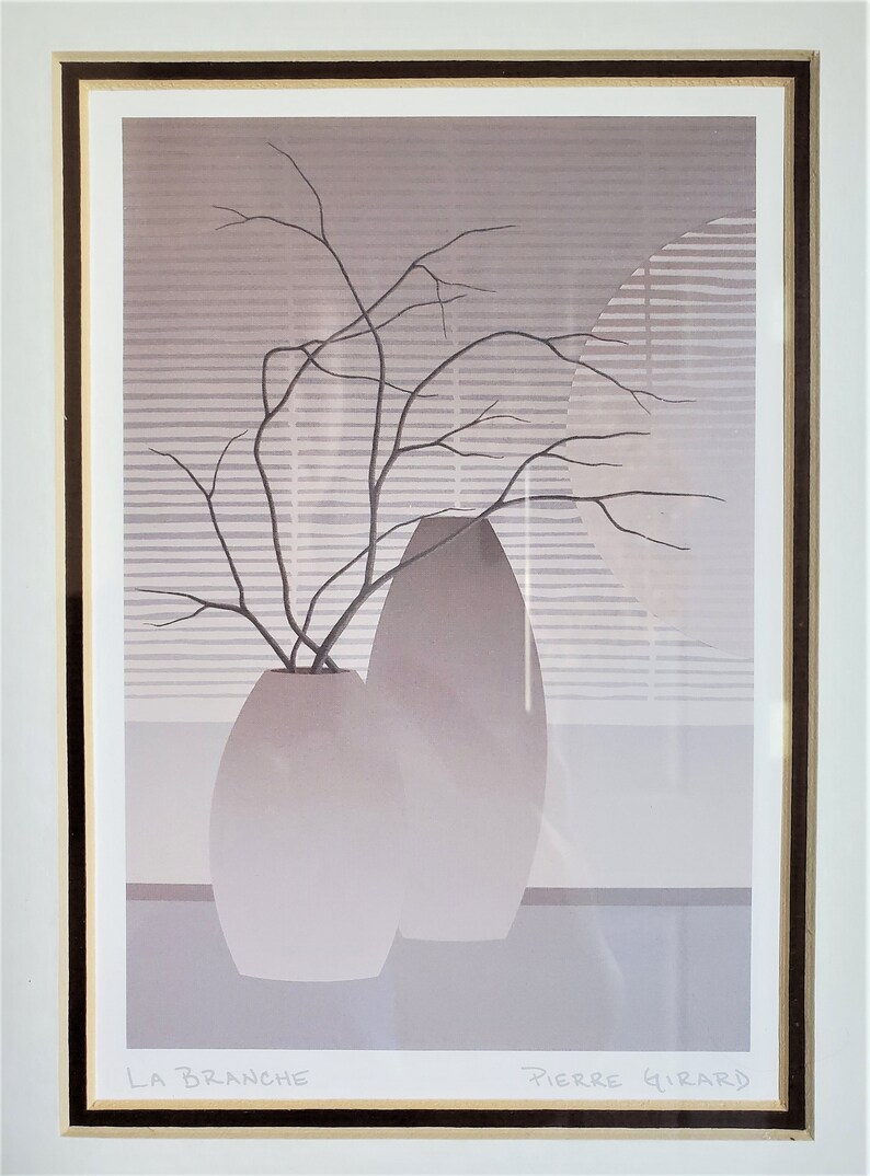May include: A framed print of a minimalist still life featuring two gray ceramic vases with a branch of bare twigs in the smaller vase. The background is a light gray with a pattern of horizontal lines. The print is signed "LA BRANCHE" and "PIERRE GIRARD".