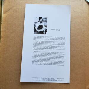May include: A black and white photo of Pierre Girard, a Canadian artist, with a biography of his life and work. The text mentions that he is a self-taught artist who has been studying art since the age of 11. He is known for his serigraphs and has participated in exhibitions in Canada and the USA.