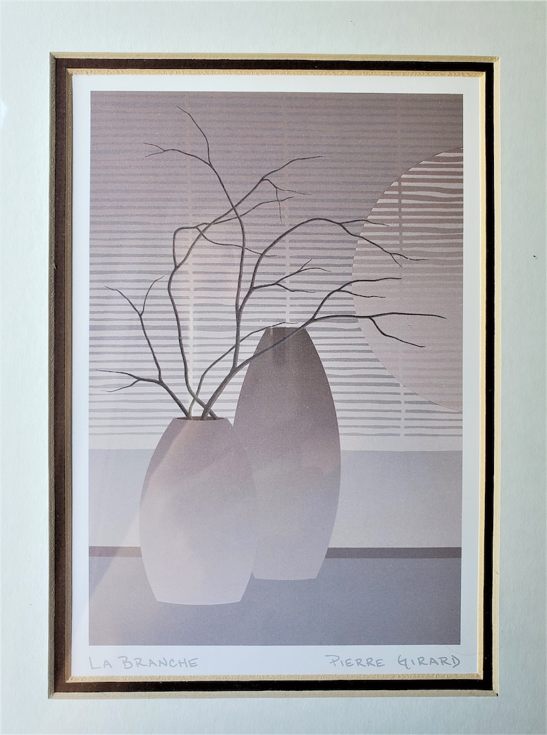May include: A framed print of a minimalist still life featuring two gray ceramic vases with a branch of bare twigs in one of the vases. The background is a light gray with a pattern of horizontal lines. The print is signed "LA BRANCHE" and "PIERRE GIRARD".