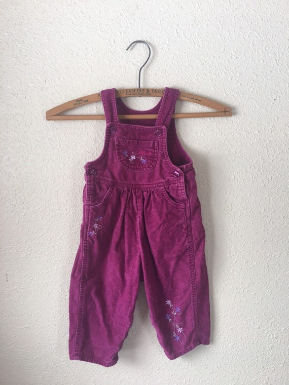 magenta overalls