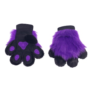 May include: A pair of black and purple furry paw gloves. The gloves have black palms with purple paw pads and a purple star design. The cuffs and fur are purple. The gloves are designed to resemble animal paws.