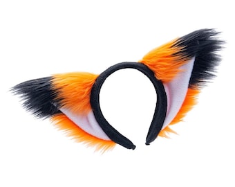 May include: A headband with plush fox ears. The ears are orange, white, and black, with a black headband. The ears are fluffy and detailed, perfect for cosplay or costume parties.