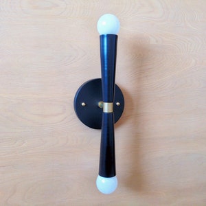 Mid Century Modern Wall Sconce: Black Bowtie Light with Raw Brass Accents