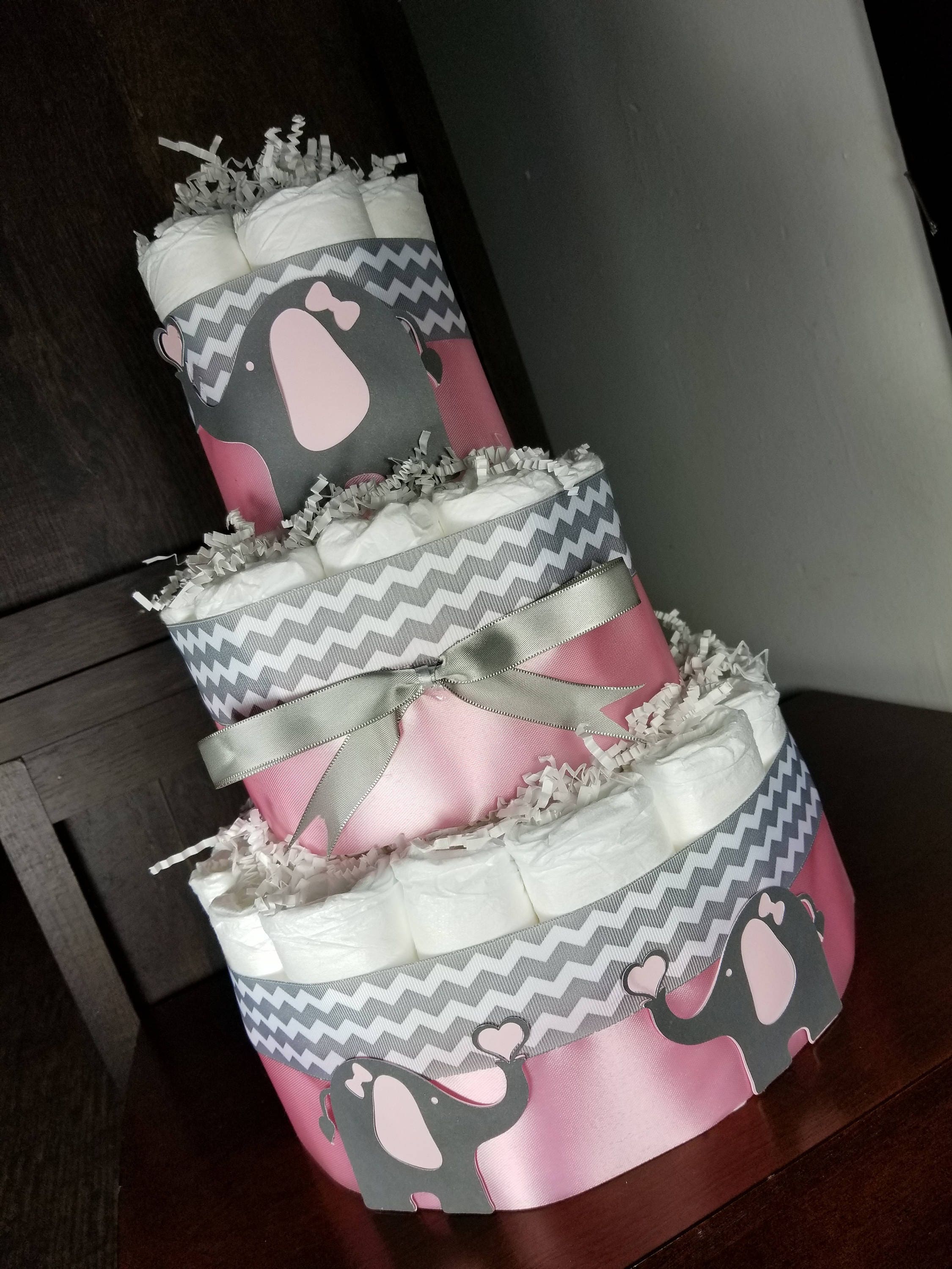 pink and gray diaper cake
