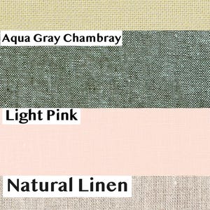 May include: A fabric swatch image showcasing four different textiles. The top swatch is a Golden Sage color, followed by Aqua Gray Chambray, Light Pink, and Natural Linen. Each fabric sample has a label with its respective color name.