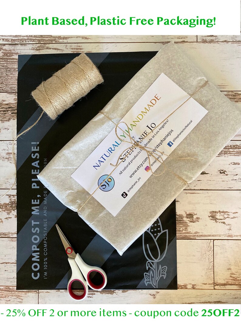 May include: A rectangular package wrapped in light beige paper with a white label reading NATURALLY HANDMADE STEPHANIE JO, tied with tan twine. Beside it sits a spool of twine, a pair of white scissors, and a black compostable shipping mailer.
