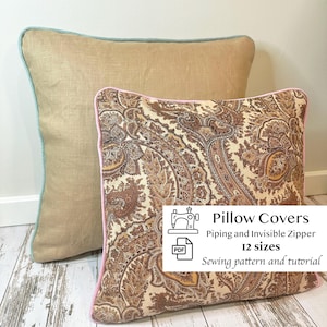 May include: Two pillow covers, one with a beige linen fabric and a light blue piping, and the other with a paisley pattern and pink piping. The pillow covers are on a light wood floor. The text on the image reads "Pillow Covers Piping and Invisible Zipper 12 sizes Sewing pattern and tutorial".