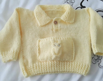 Hand knitted unisex baby sweater with owl pocket