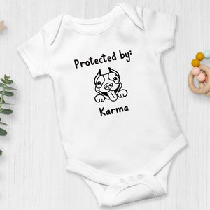 Protected By Dog Personalized Onesie® | Custom Dog Breed Onesie